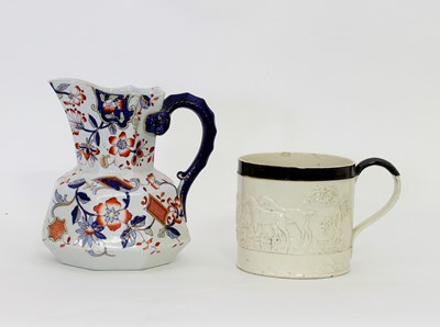 Lot 712 - A 19th Century Staffordshire mug, moulded with...