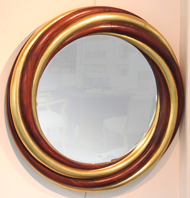 Lot 28 - A circular mahogany and gilded wall mirror,...