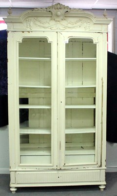 Lot 38 - A painted French armoire, enclosed by glazed...