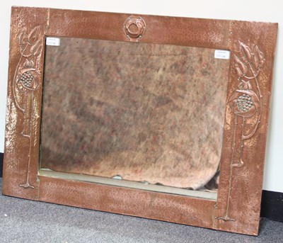 Lot 45 - An Art Nouveau copper framed mirror, the frame...