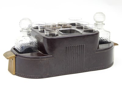 Lot 55 - An Art Deco Bakelite drinks compendium, fitted...