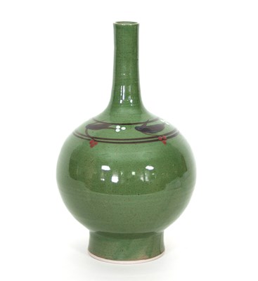 Lot 116 - Russell Collins/A stoneware green glaze bottle...