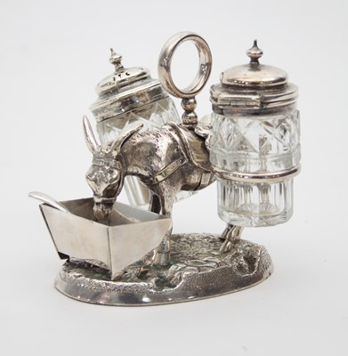 Lot 410 - A novelty white metal condiment set modelled...