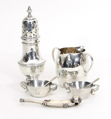 Lot 452 - A silver caster, London 1926, 17cm high, a...