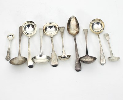 Lot 475 - A collection of George III silver sauce ladles...