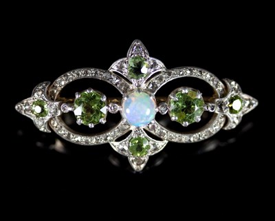 Lot 511 - An Edwardian opal, peridot and diamond brooch,...