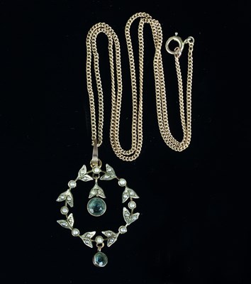 Lot 519 - An aquamarine and seed pearl wreath type...