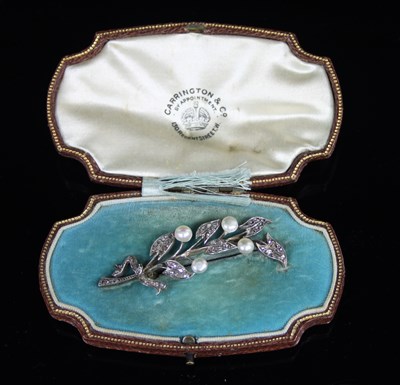 Lot 535 - A diamond and pearl leaf spray brooch, the...