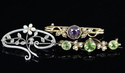 Lot 542 - A diamond and pearl brooch of flower spray...