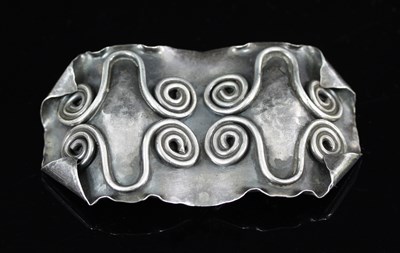 Lot 550 - A French hammered silver brooch of modern...