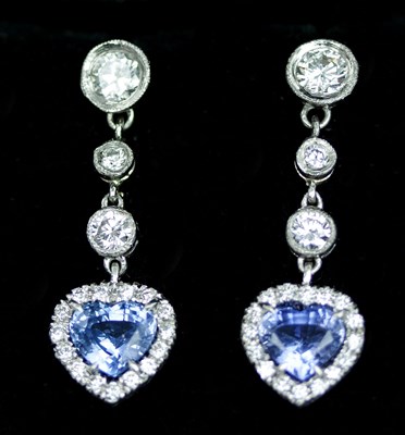 Lot 557 - A pair of sapphire and diamond ear pendants,...