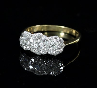 Lot 568 - A diamond triple cluster ring, the conjoined...