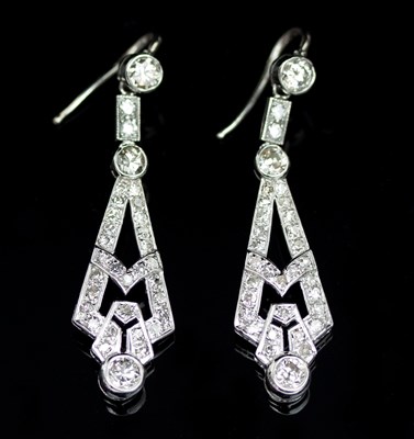 Lot 581 - A pair of Art Deco style diamond ear pendants...