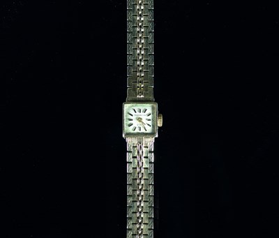 Lot 597 - A 9ct gold Marin wristwatch with square face...