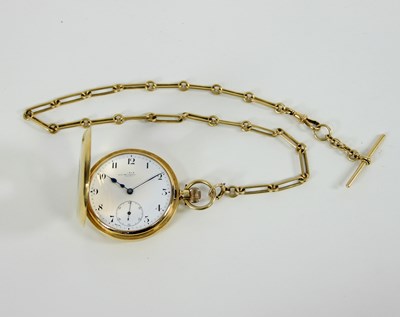 Lot 607 - An 18ct gold half-hunter watch, the enamel...