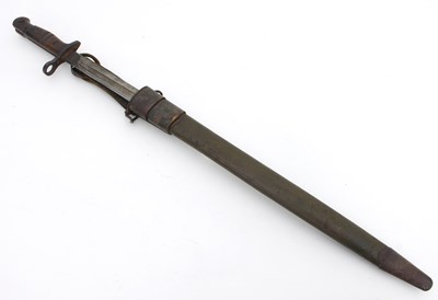 Lot 629 - A bayonet in a leather scabbard, dated 1918,...