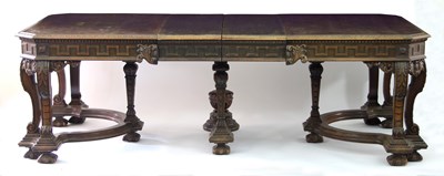 Lot 668 - A Continental walnut centre table with carved...