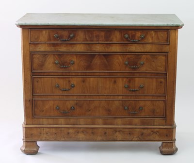 Lot 676 - A French 19th Century walnut commode, the...