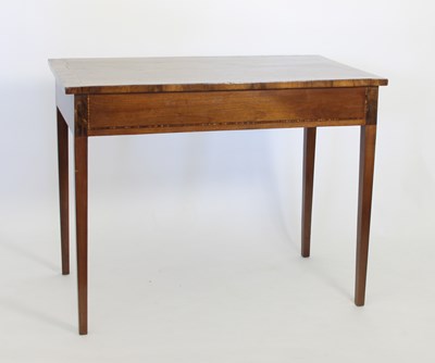 Lot 702 - An Edwardian mahogany writing table, 103cm wide