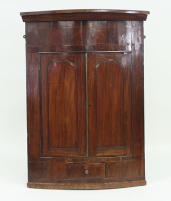 Lot 712 - A Victorian mahogany bowfront hanging corner...