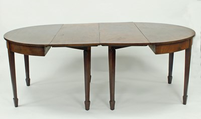 Lot 713 - A George III mahogany D-end dining table with...