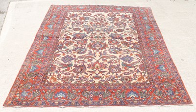 Lot 735 - An Agra carpet with camel coloured central...