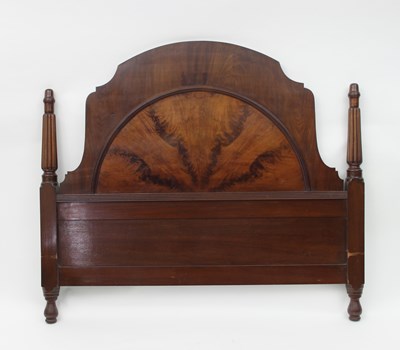 Lot 736 - A mahogany arch top headboard with reeded...