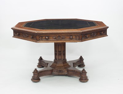 Lot 740 - A Victorian gothic oak library table, the...