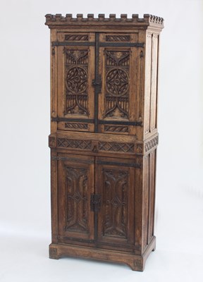 Lot 743 - A French 19th Century gothic cupboard in two...