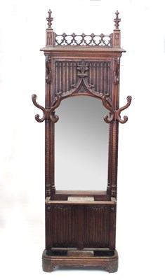 Lot 749 - A Victorian gothic oak hall stand with poppy...