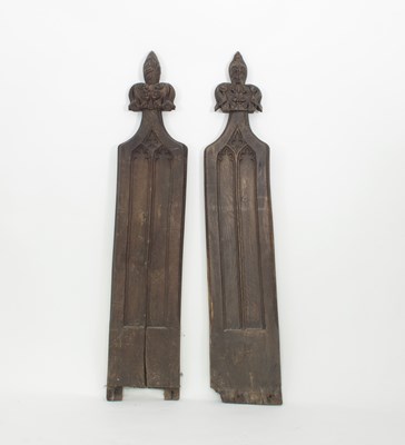 Lot 750 - A pair of Victorian gothic oak pew ends with...