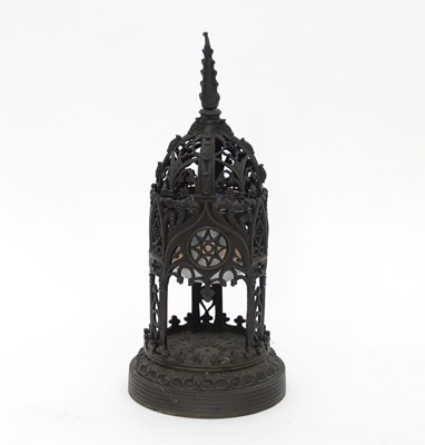 Lot 765 - A George IV gothic bronze candle stand chimney...