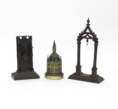 Lot 767 - A Victorian gothic metal stationery rack, an...