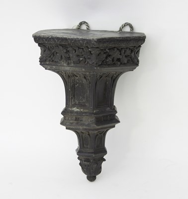 Lot 768 - A Victorian gothic pewter wall bracket with...