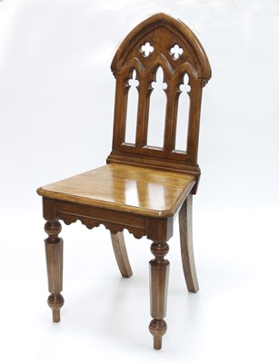 Lot 778 - A Victorian Gothic revival oak hall chair, the...