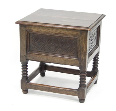 Lot 787 - An oak box top chest with hinged cover and...