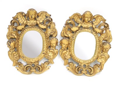 Lot 788 - A pair of wall mirrors in giltwood frames of...