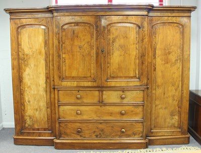 Lot 804 - A Victorian figured walnut breakfront wardrobe,...