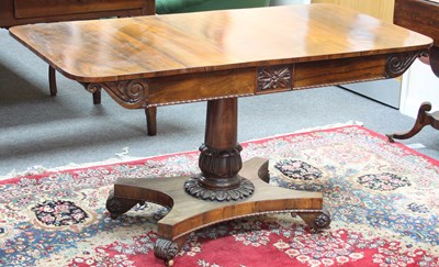 Lot 805 - A Regency rosewood library table, the...