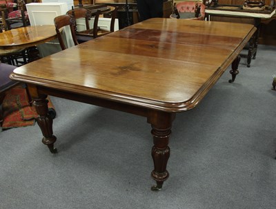 Lot 806 - A mahogany extending dining table of...