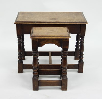 Lot 819 - An oak rectangular table united by square...