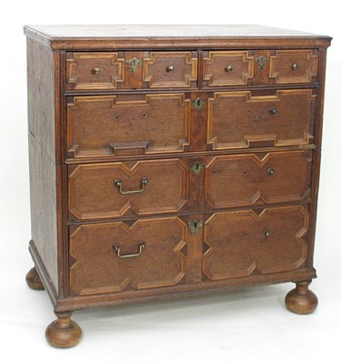 Lot 833 - An early 18th Century oak chest, in two...