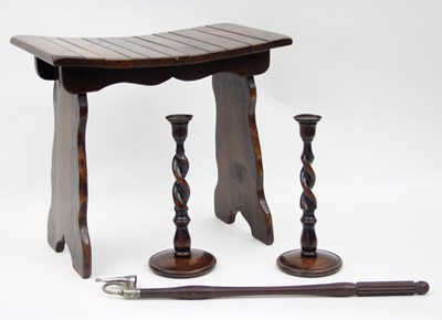 Lot 835 - A pair of wooden candlesticks with twisted...