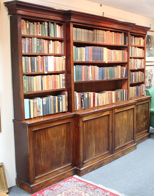 Lot 850 - A 19th Century mahogany breakfront bookcase,...