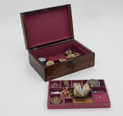 Lot 865 - A mahogany and mother-of-pearl inlaid workbox,...