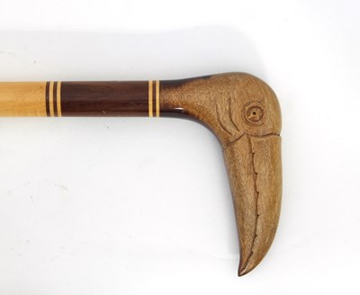 Lot 869 - A specimen wood walking stick, the handle...