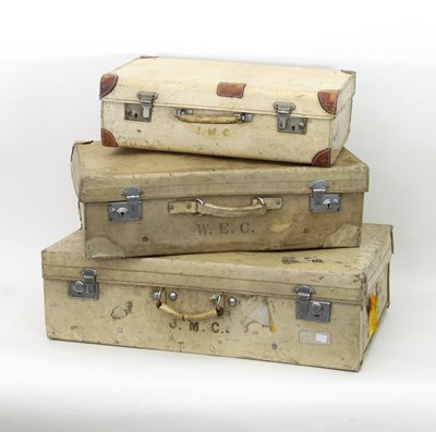 Lot 877 - Three white leather suitcases