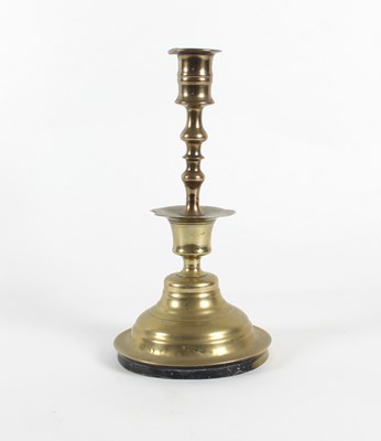 Lot 915 - A 17th Century style Dutch brass candlestick,...