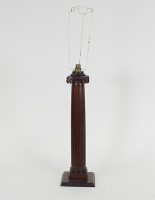 Lot 921 - A carved wooden lamp, of Corinthian column...