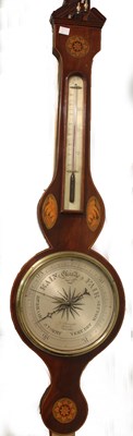 Lot 938 - A mahogany wheel barometer and thermometer,...